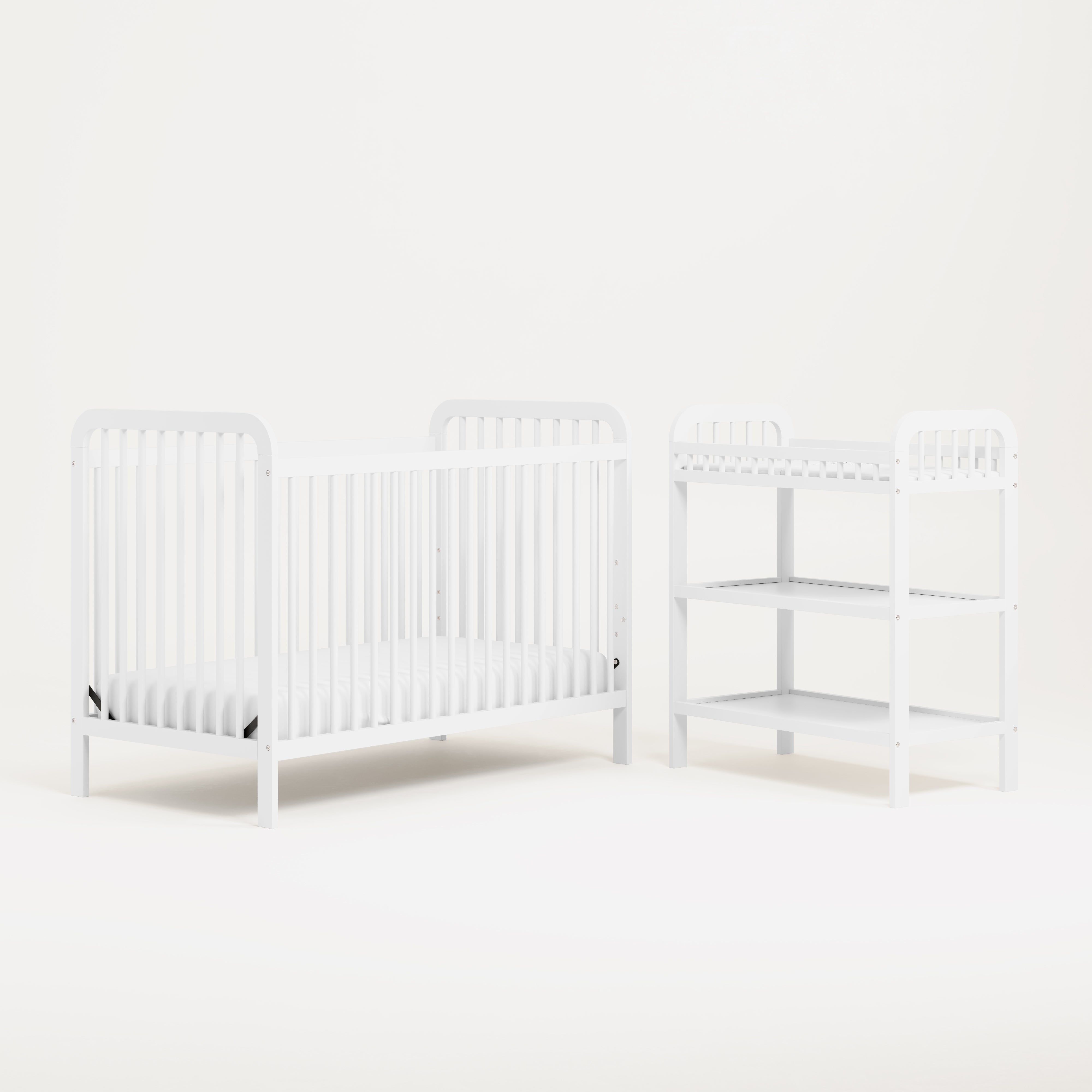 white pasadena changing table and crib side view