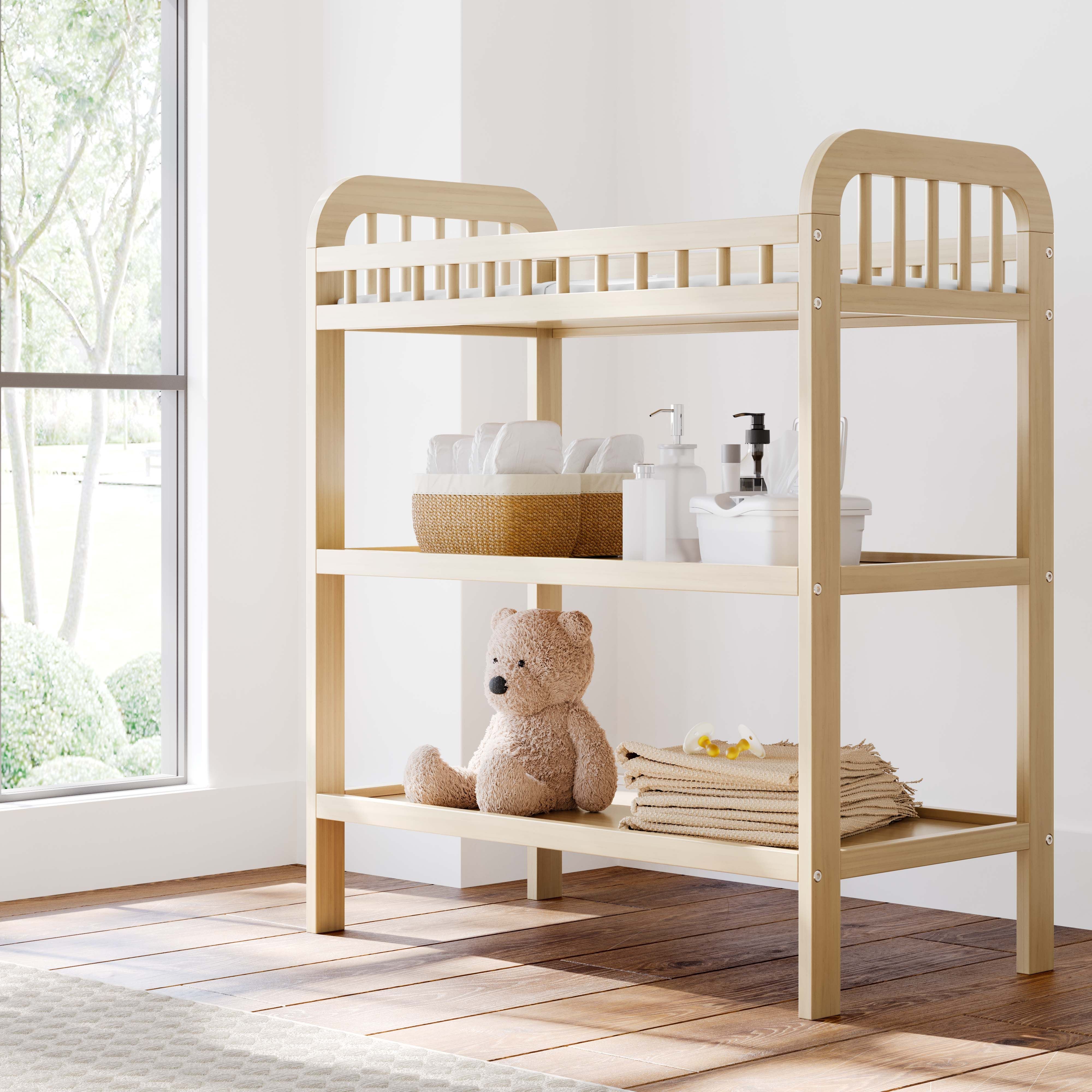 pasadena changing table driftwood side view in bathroom with items