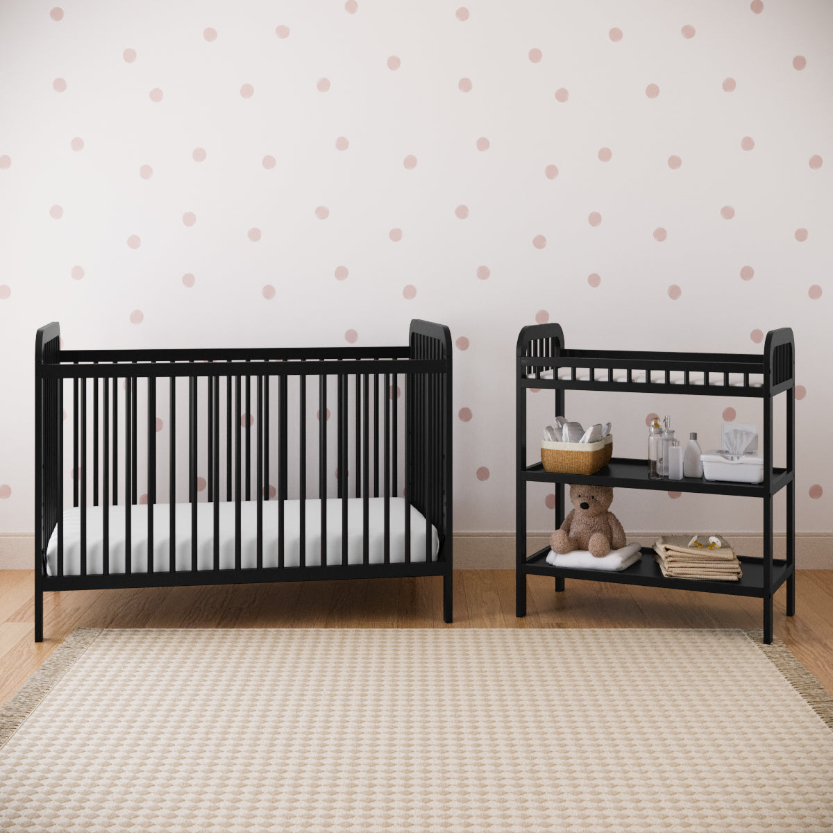 pasadena changing table black with crib front view in bedroom