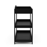 side view of black changing table with removable headboard and two open shelves