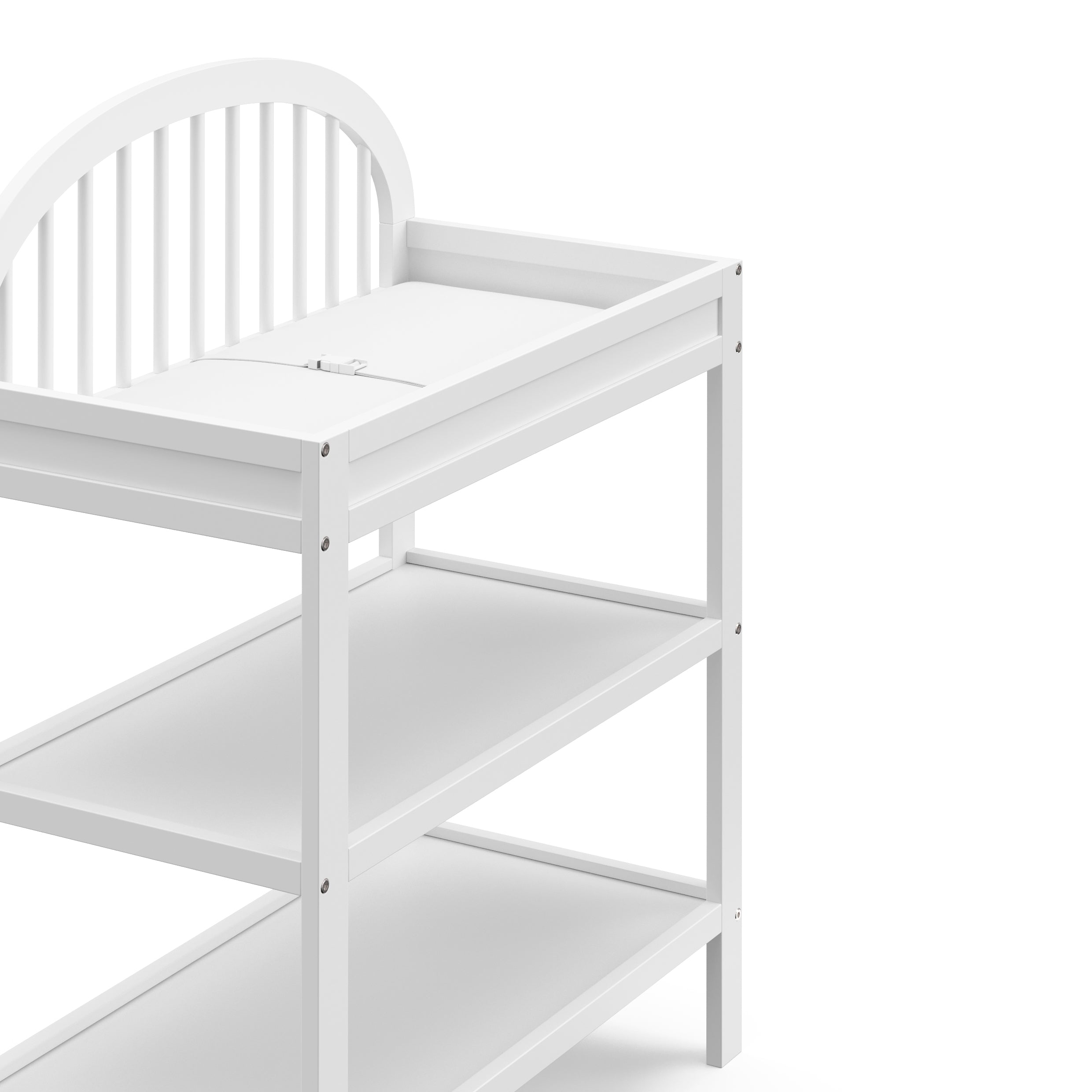 close view of white changing table