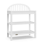 angled view of white changing table