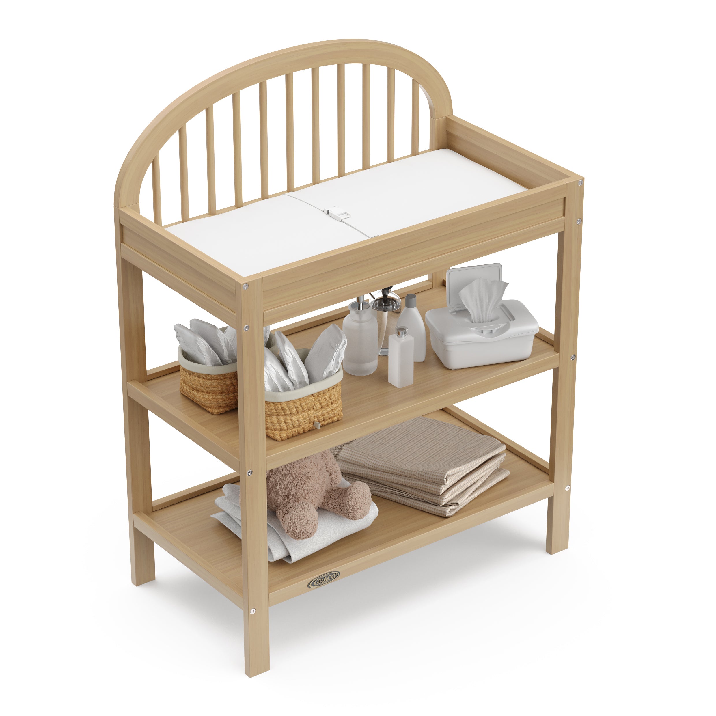 Graco® Olivia™ Changing Table with Bonus Water-Resistant Changing Pad.