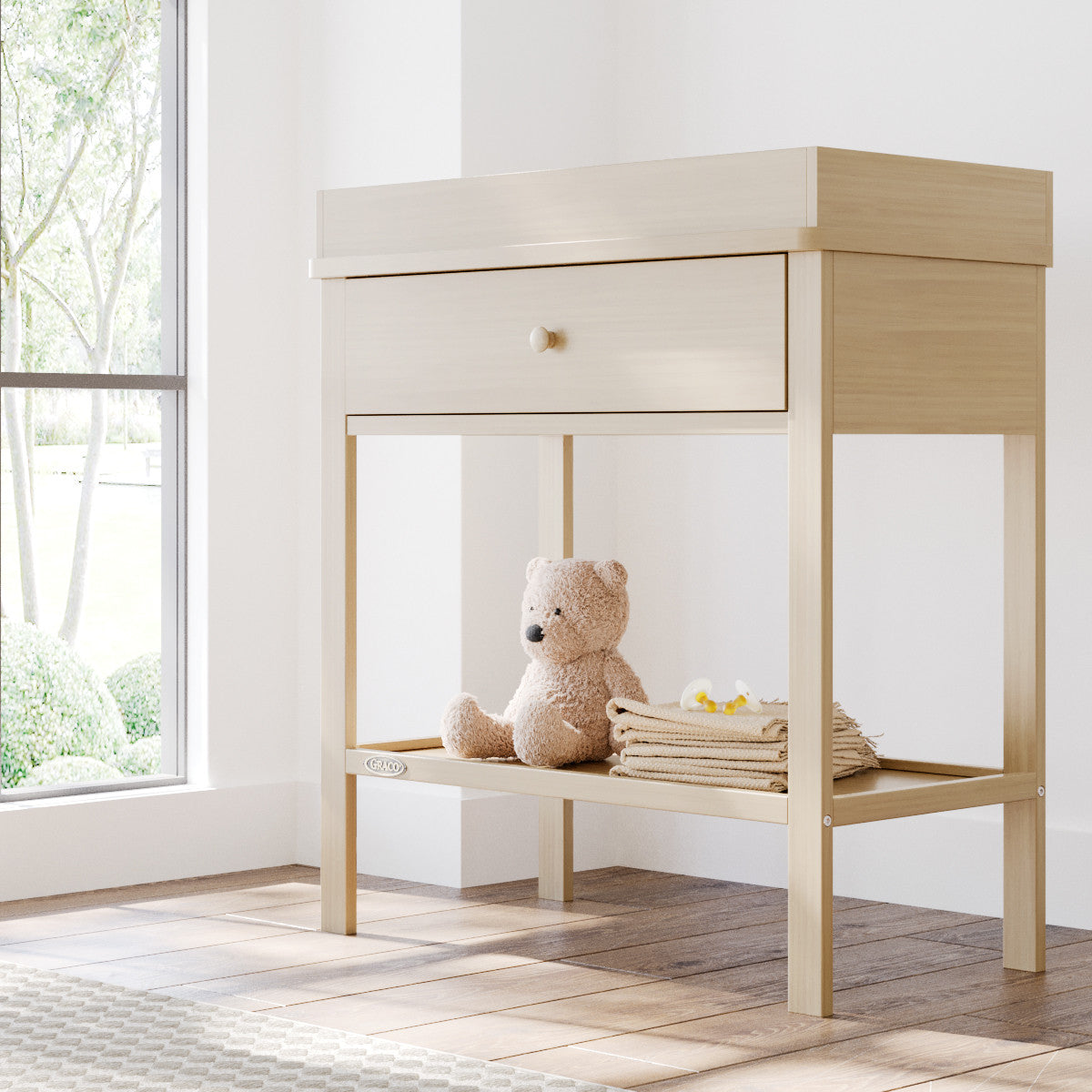 Graco® Storage Changing Table.