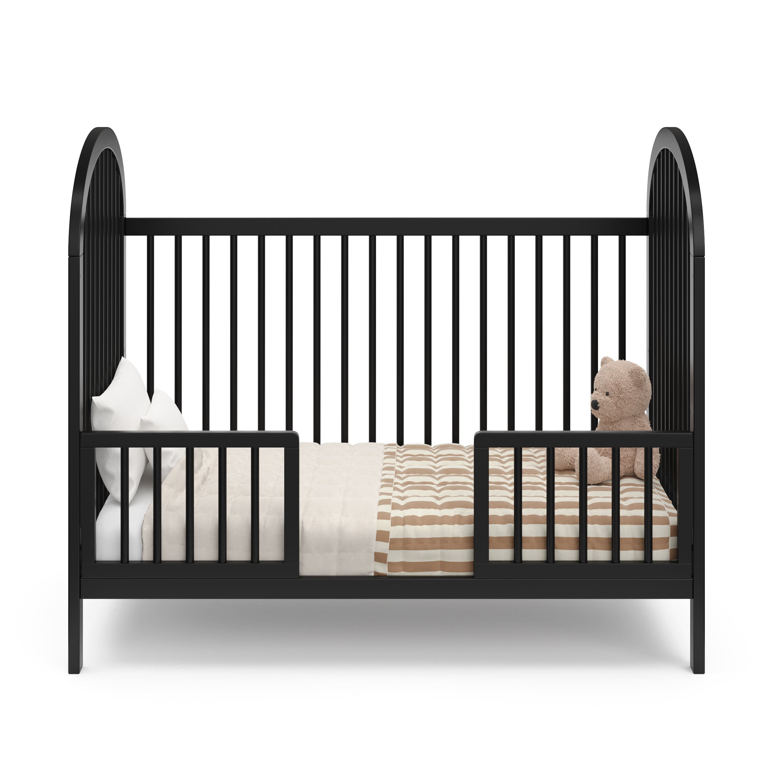 Black Toddler Safety Guardrail Kit with dowels applied in toddler bed