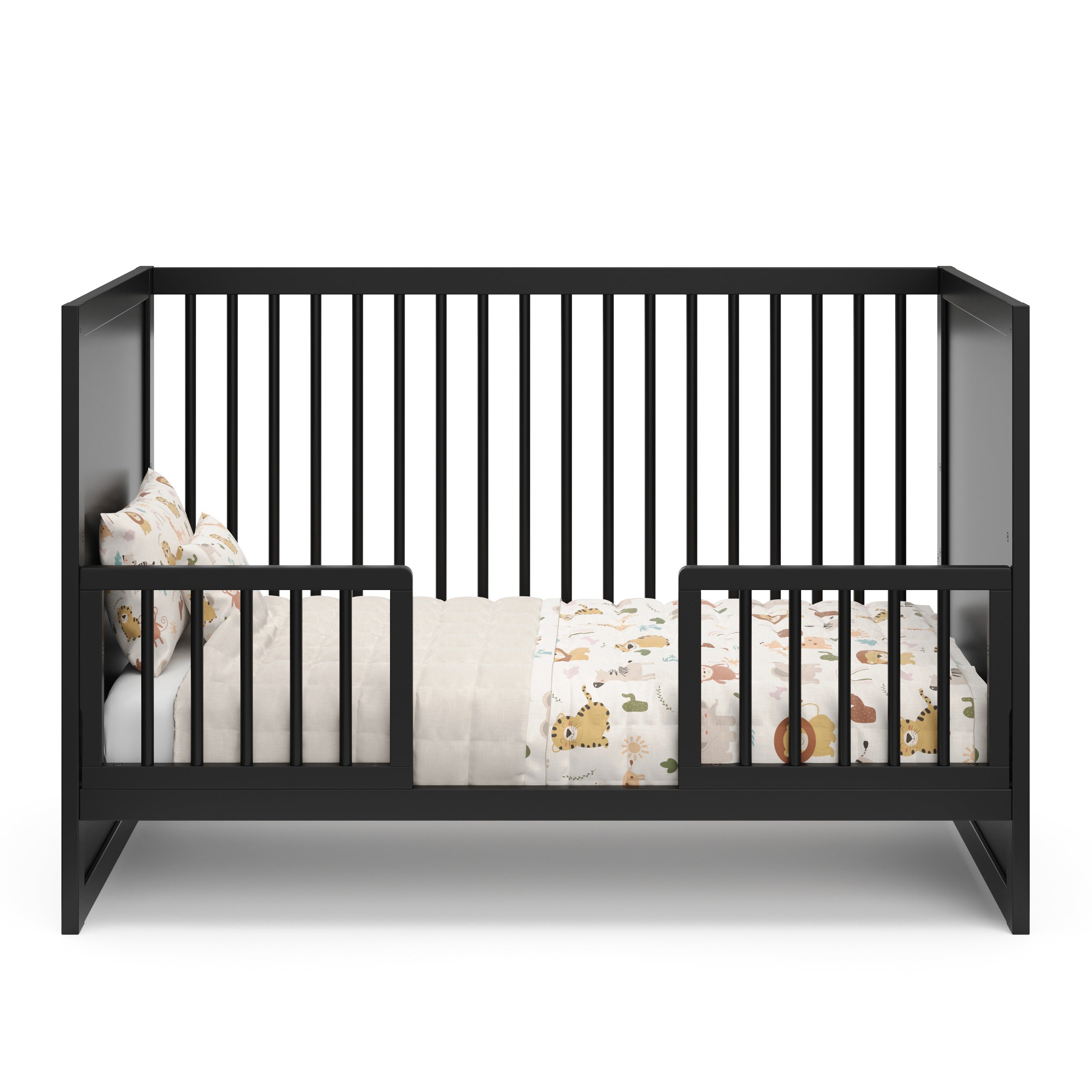 Black Toddler Safety Guardrail Kit with dowels applied in toddler bed