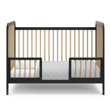 Black with driftwood Toddler Safety Guardrail Kit with dowels applied in toddler bed