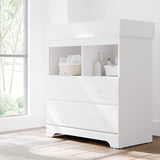 white 2 drawer chest with changing topper in nursery