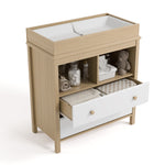 alpine 2 drawer changing chest white with driftwood top view with changing pad and changing essentials in exterior shelves and top drawer