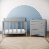 pebble gray 3 drawer chest with changing topper with crib in nursery