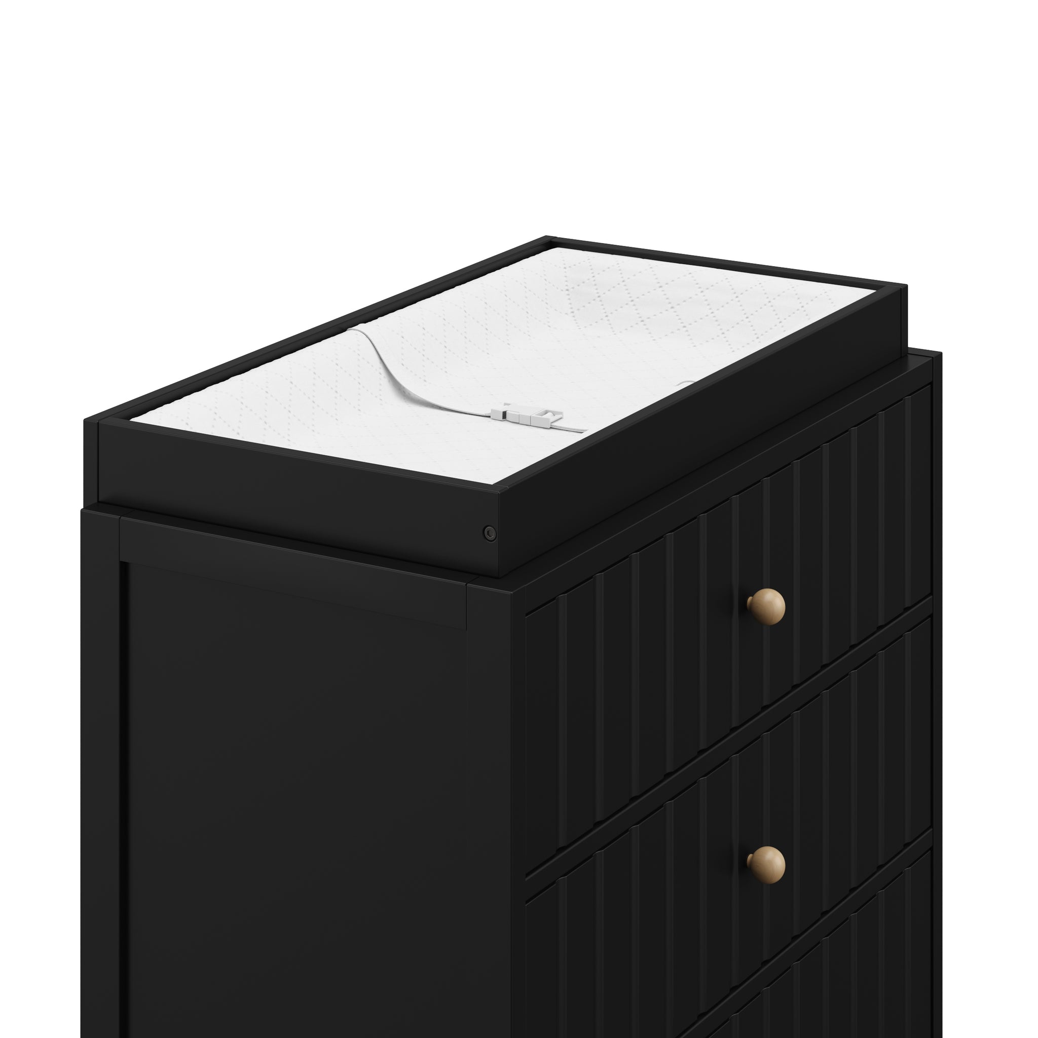 top view of black 3 drawer chest with topper with changing pad