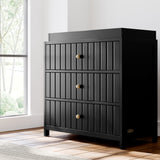 Black 3 drawer chest in nursery