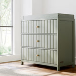 3 Drawer Chest with Changing Topper in a nursery (Olive with Driftwood)