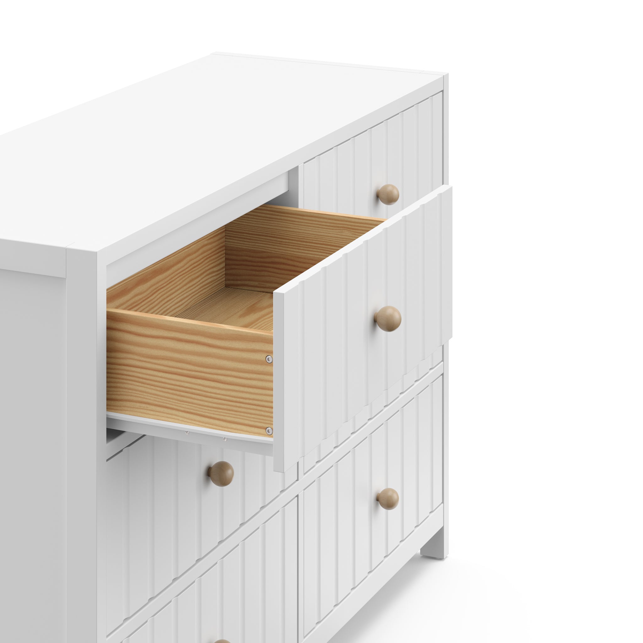 Top view of white 6 drawer dresser with open drawer