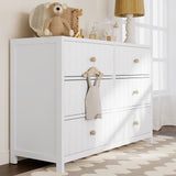 White 6 drawer dresser in nursery setting