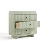 3 drawer chest with changing topper angled view with middle drawer open sage