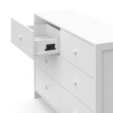  Top-side view of a white dresser with one open drawer, showcasing an interlocking drawer system.