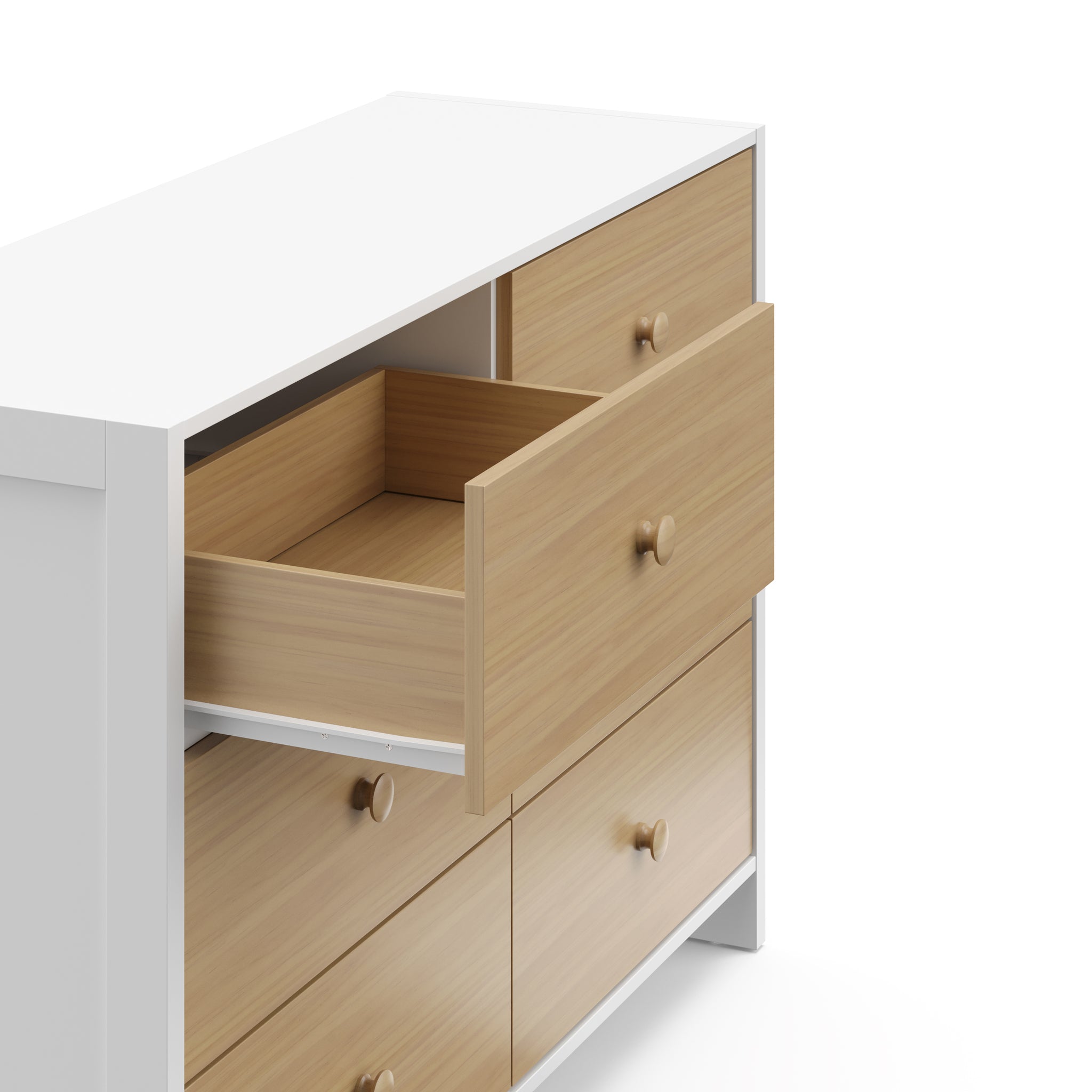 Top-angled view of a white with driftwood dresser with one open drawer
