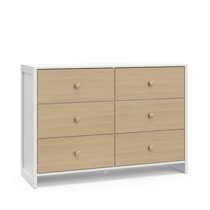 Angled view of a white with driftwood dresser with 6 drawers