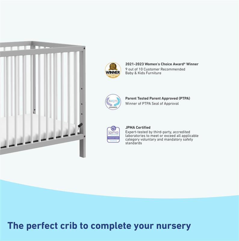 pebble gray and white mini crib with awards and certifications