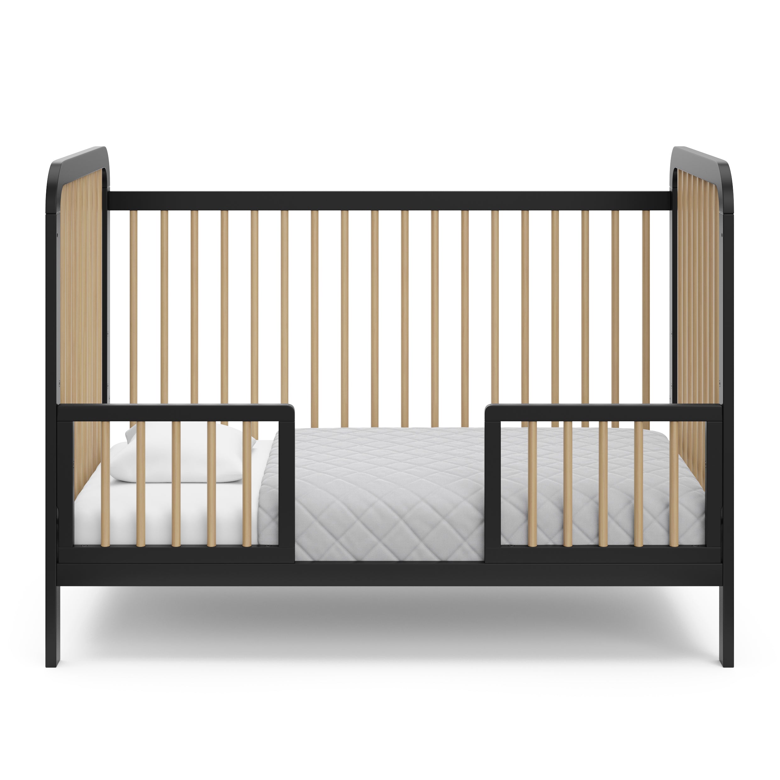 Black with driftwood crib in toddler bed conversion with two guardrails