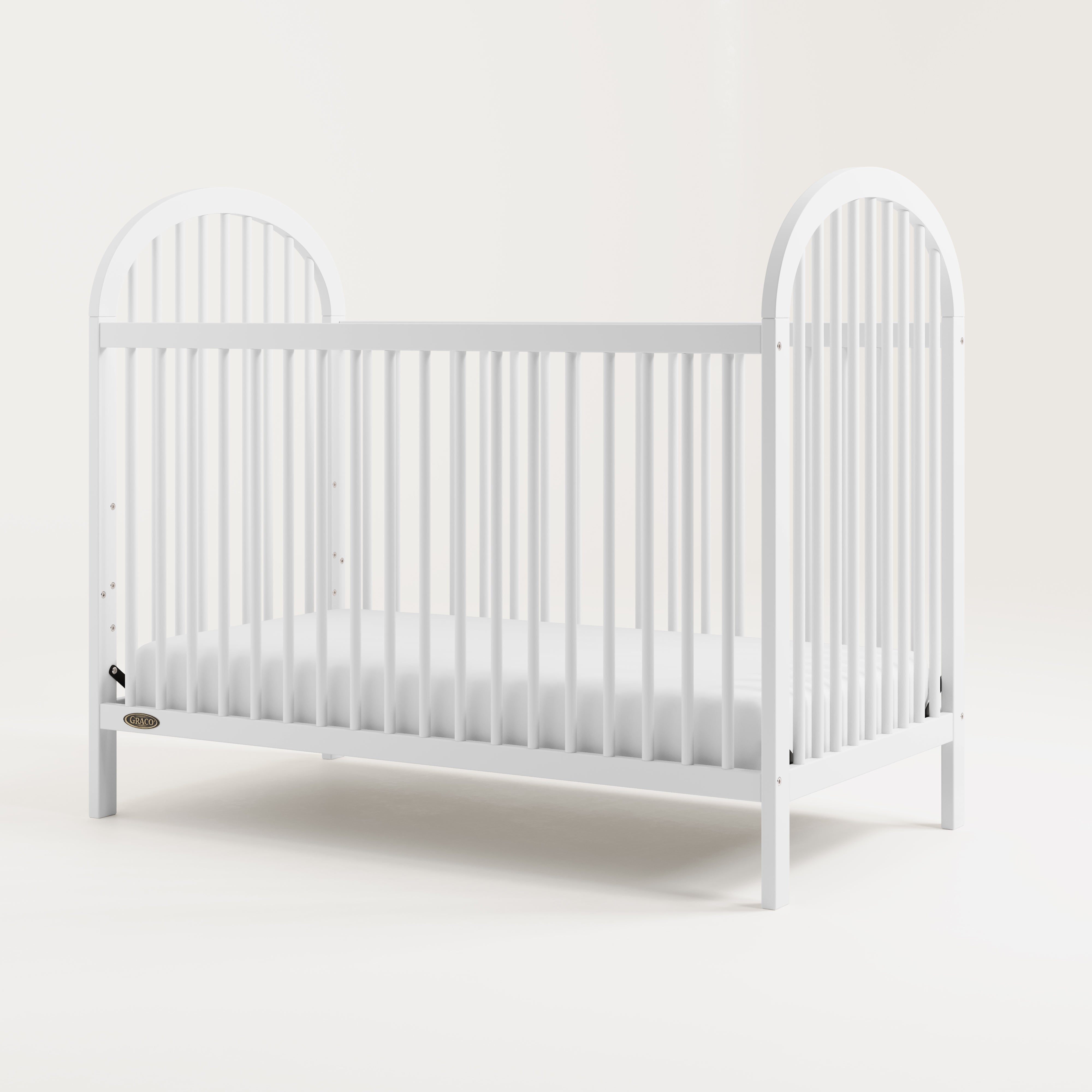 graco olivia crib white side view