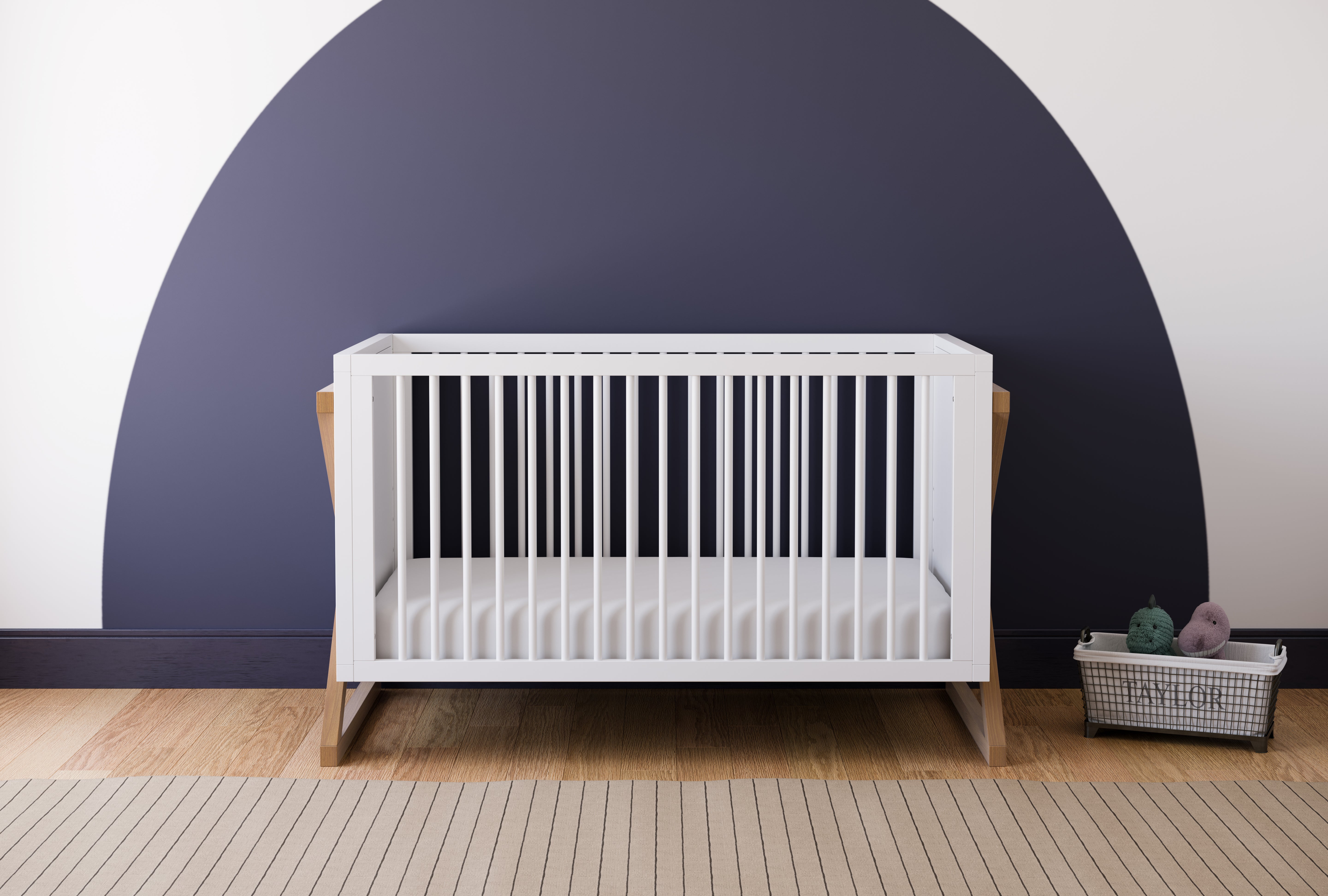 white and vintage driftwood crib in nursery