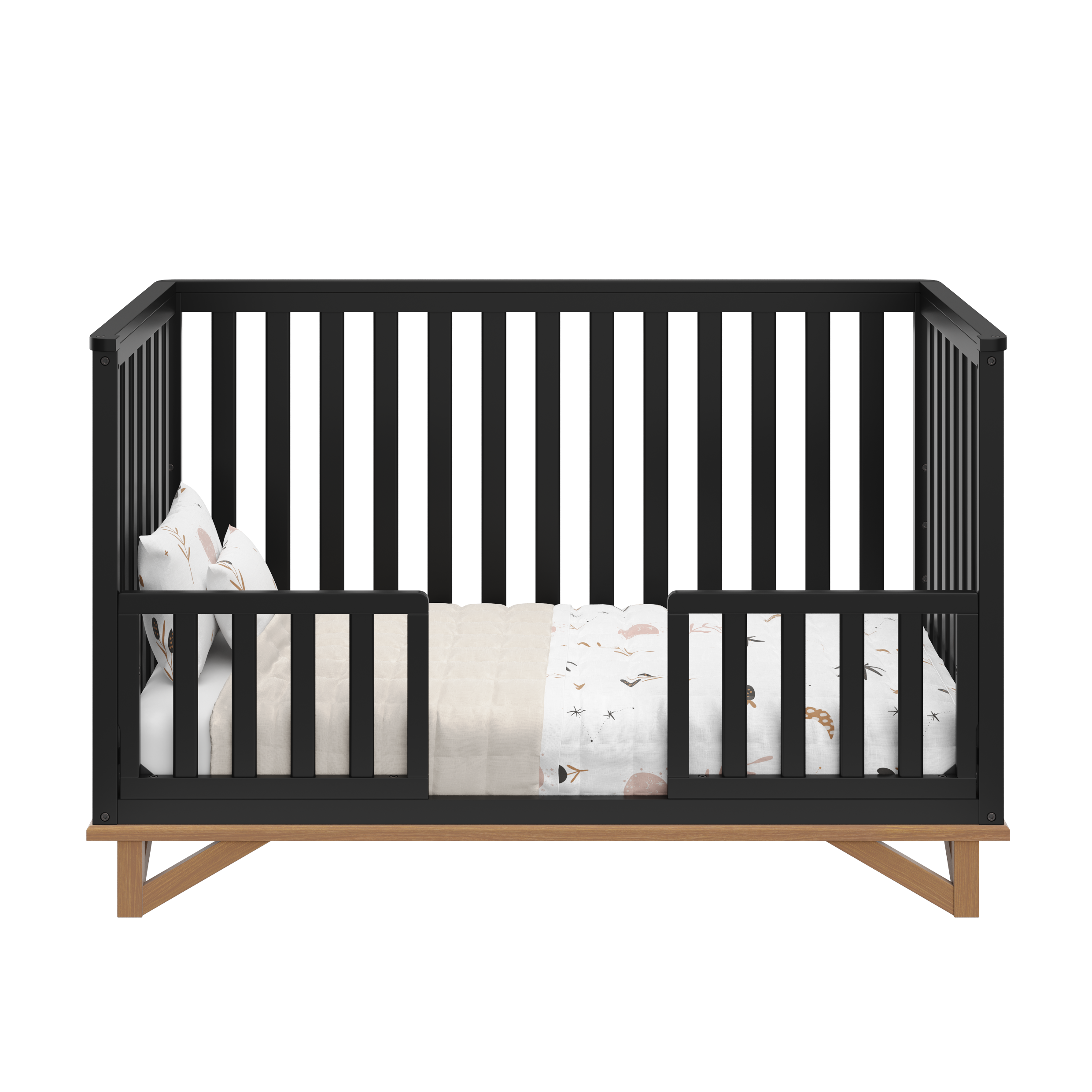 black with vintage driftwood crib in toddler bed conversion with two toddler safety guardrails