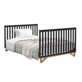 black with vintage driftwood crib in full-size bed conversion with both headboard and footboard