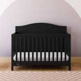 Black crib in nursery