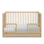 Driftwood crib with drawer in toddler bed conversion with two safety guardrails