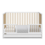 White with driftwood crib with drawer in toddler bed conversion with two safety guardrails