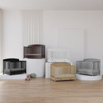 5 cribs with drawer showcased in different colors and different heights