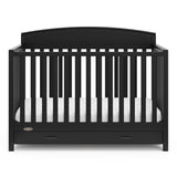 black crib with drawer