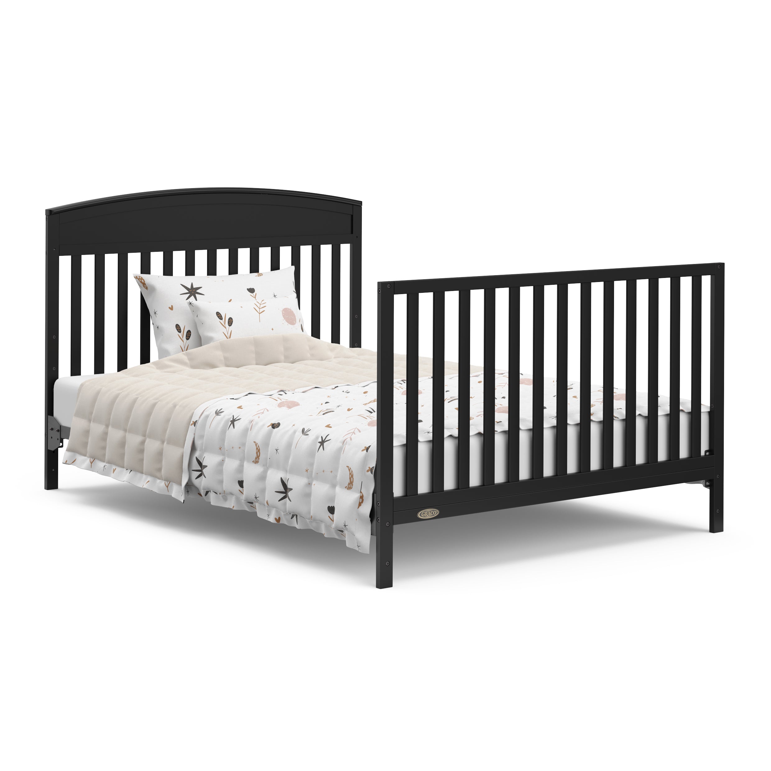 black crib with drawer in full-size bed conversion with both headboard and footboard