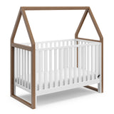 angled view of crib (hazelnut with white)