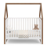 Crib with canopy in toddler bed conversion with guardrails (White with hazelnut)