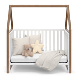 Crib with canopy in daybed conversion (White with hazelnut)