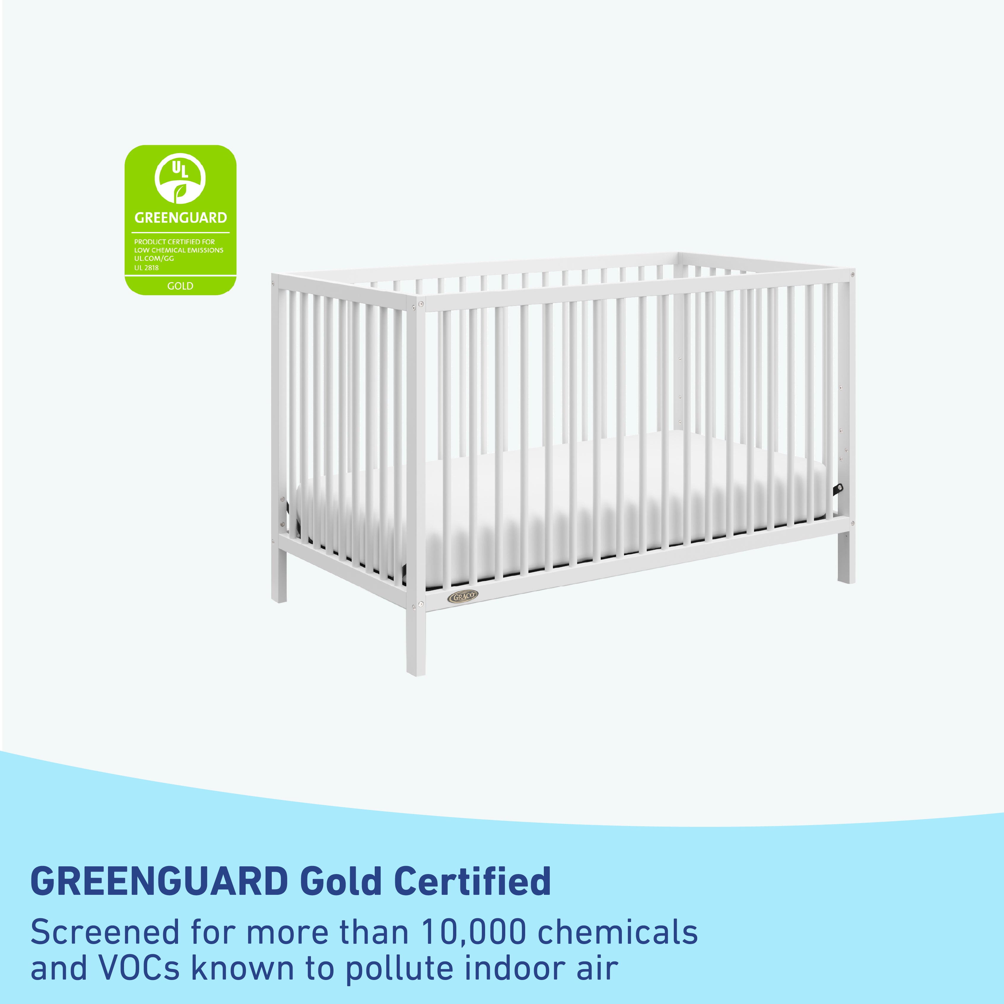 White crib with GREENGUARD Gold Certified badge