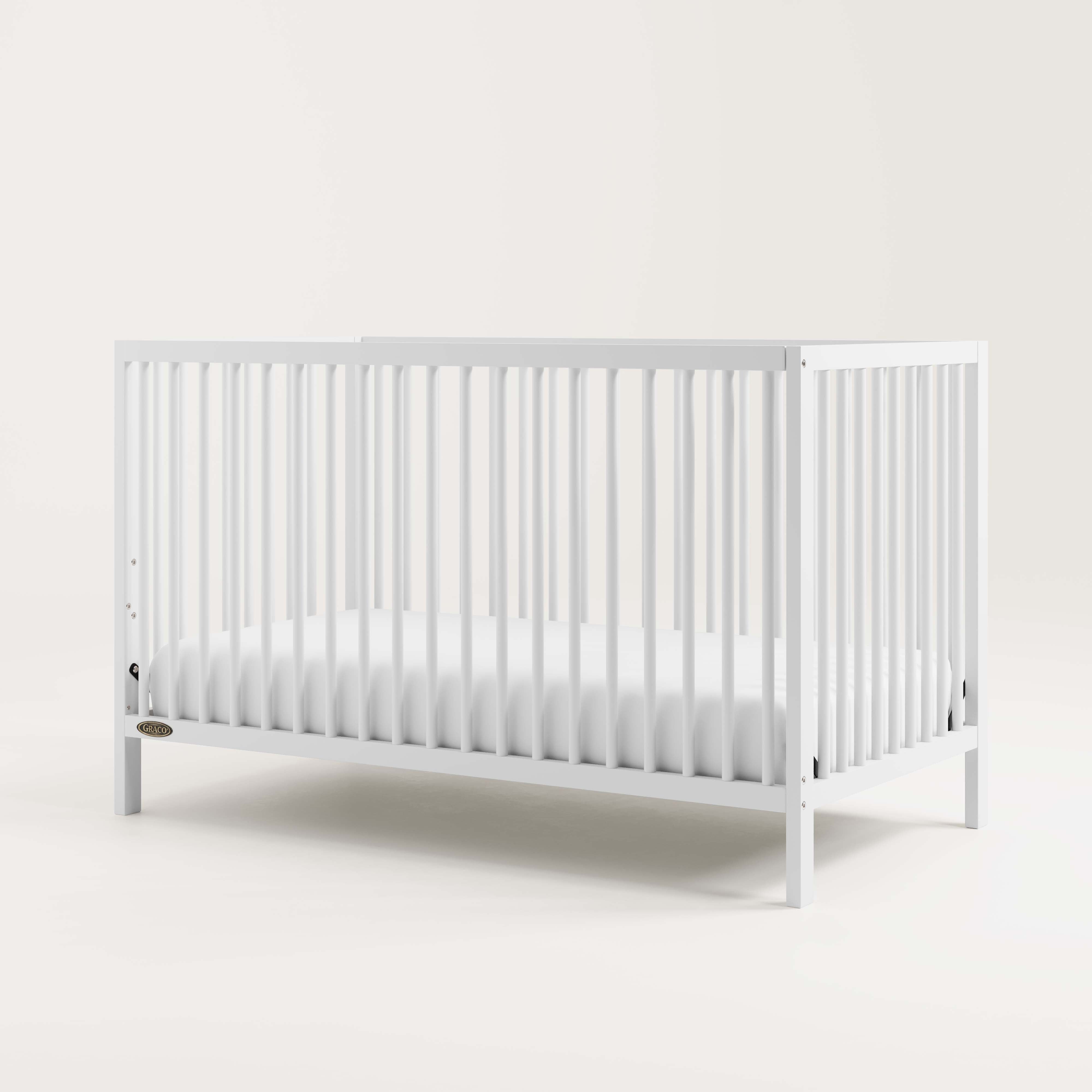 Angled view of white crib