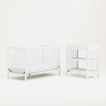 White crib and changing table 