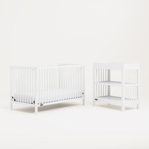 White crib and changing table 