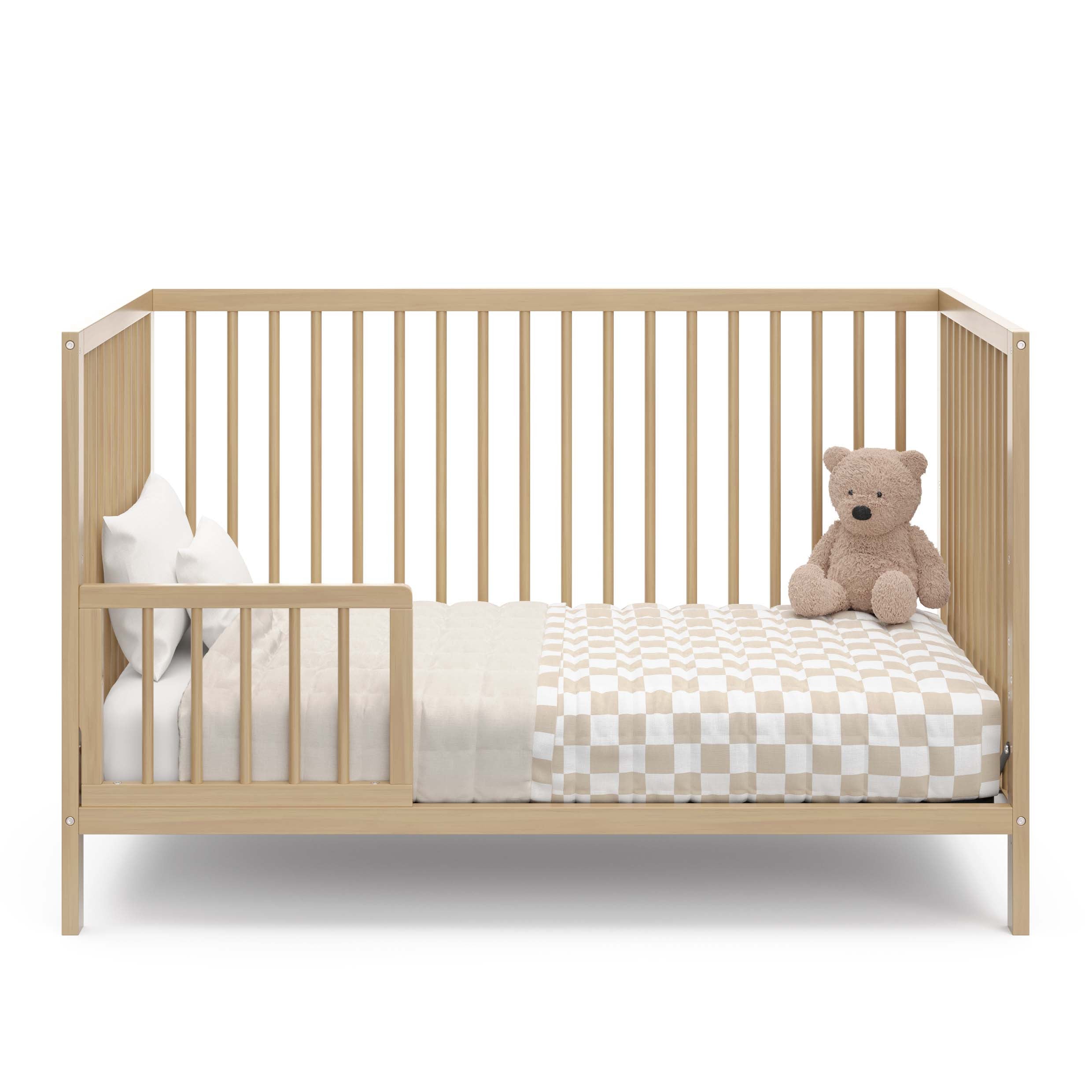 driftwood crib in toddler bed conversion with one guardrail