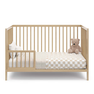 driftwood crib in toddler bed conversion with one guardrail