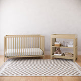 Driftwood crib and changing table in a nursery