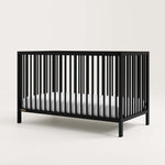 Angled view of black crib