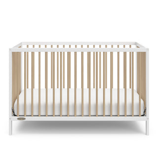 front view of white with driftwood crib