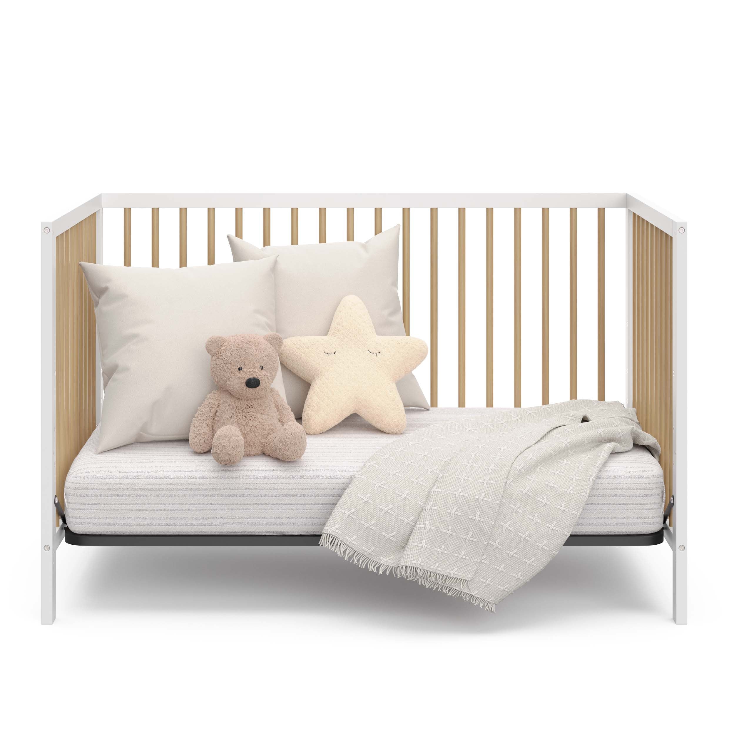 Graco® Teddi® 5-in-1 Convertible Crib.