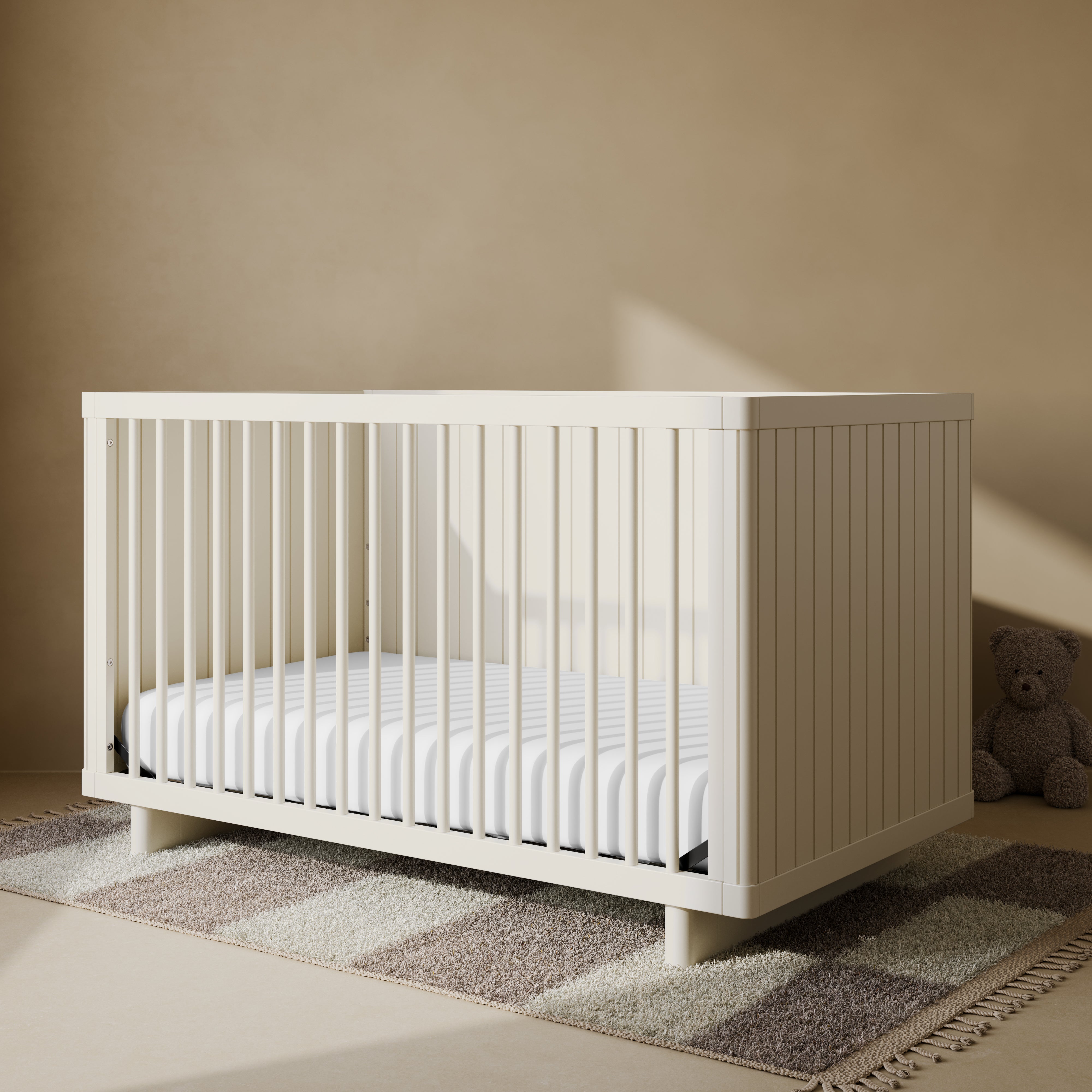 Storkcraft® Kyoto Deluxe 3-in-1 Convertible Crib with Bonus Toddler Guardrail.