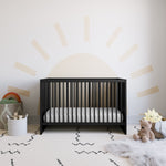 black calabasas crib in nursery